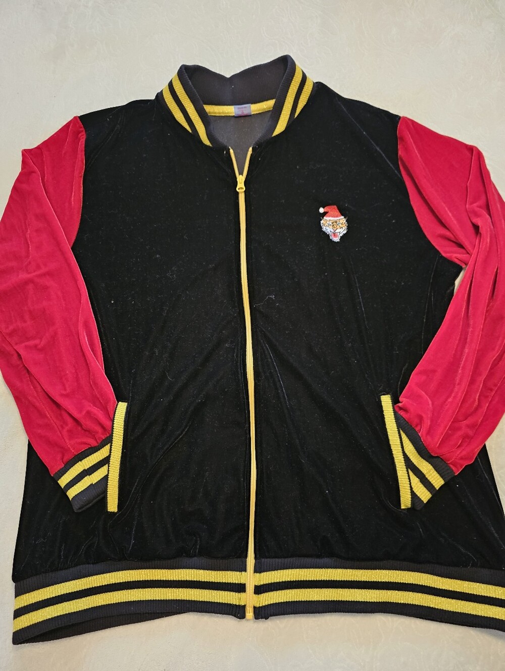 Holiday Time Black Jacket with Red Sleeves and Yellow Trim